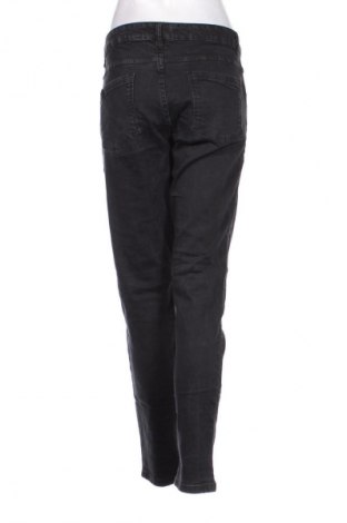 Damskie jeansy Blue Motion, Rozmiar XL, Kolor Czarny, Cena 38,99 zł