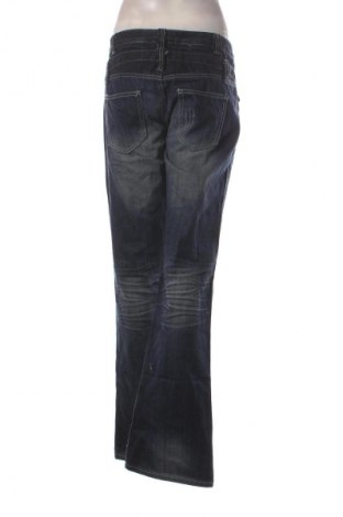 Damskie jeansy Clockhouse, Rozmiar L, Kolor Niebieski, Cena 95,99 zł