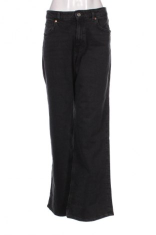 Damskie jeansy H&M, Rozmiar L, Kolor Kolorowy, Cena 68,33 zł