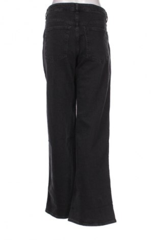 Damskie jeansy H&M, Rozmiar L, Kolor Kolorowy, Cena 68,33 zł