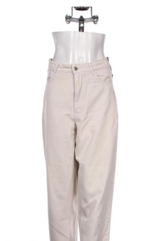 Damskie jeansy H&M, Rozmiar M, Kolor Beżowy, Cena 66,67 zł
