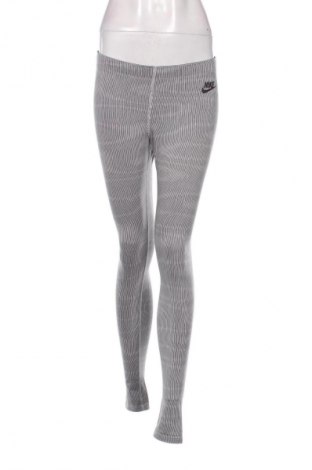 Damskie legginsy Nike, Rozmiar S, Kolor Kolorowy, Cena 67,41 zł