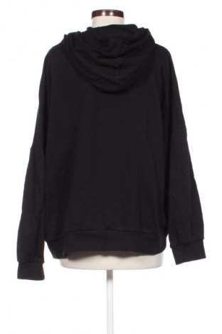 Damska bluza H&M Divided, Rozmiar L, Kolor Czarny, Cena 68,31 zł