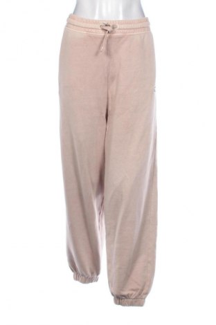 Damskie spodnie sportowe Tommy Jeans, Rozmiar M, Kolor Beżowy, Cena 109,99 zł