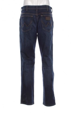 Męskie jeansy Wrangler, Rozmiar M, Kolor Niebieski, Cena 178,32 zł
