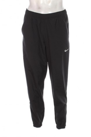 Pánské tepláky  Nike, Velikost M, Barva Černá, Cena  1 749,00 Kč