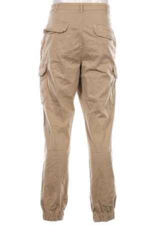 Męskie spodnie Urban Classics, Rozmiar L, Kolor Beżowy, Cena 111,99 zł