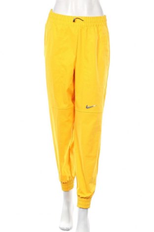 Dámské tepláky Nike, Velikost S, Barva Žlutá, Polyester, Cena  718,00 Kč