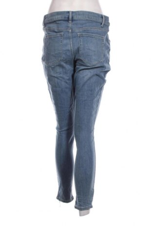 Damskie jeansy Clothing & Co, Rozmiar XL, Kolor Niebieski, Cena 66,21 zł
