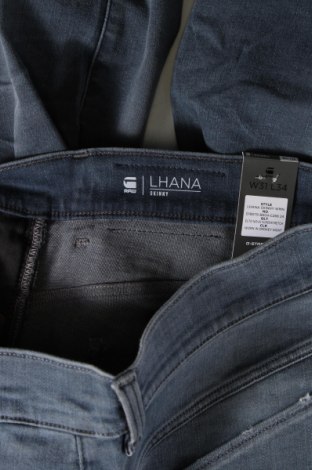 Damskie jeansy G-Star Raw, Rozmiar L, Kolor Niebieski, Cena 506,44 zł