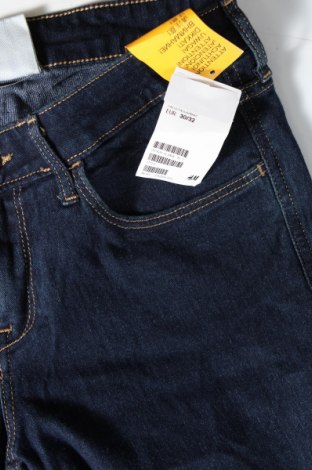 Damskie jeansy H&M, Rozmiar L, Kolor Niebieski, Cena 48,55 zł