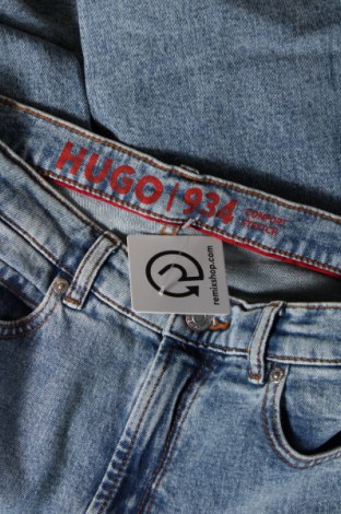 Damskie jeansy Hugo Boss, Rozmiar M, Kolor Niebieski, Cena 304,66 zł