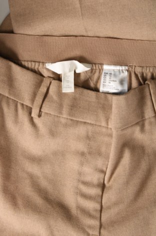 Damskie spodnie H&M, Rozmiar L, Kolor Beżowy, Cena 32,47 zł