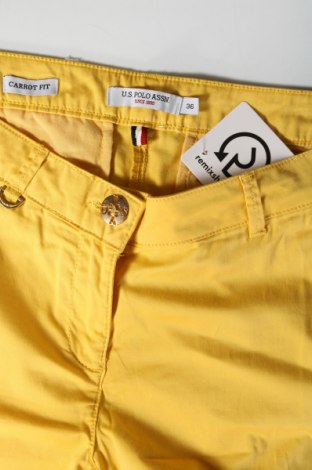 Damskie spodnie U.S. Polo Assn., Rozmiar M, Kolor Żółty, Cena 156,32 zł