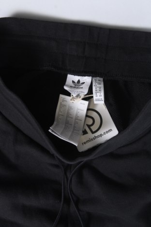 Damskie spodnie sportowe Adidas, Rozmiar M, Kolor Czarny, Cena 123,95 zł