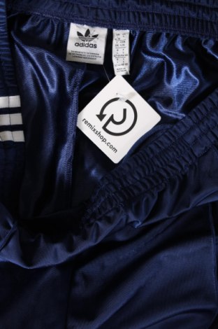 Damskie spodnie sportowe Adidas Originals, Rozmiar L, Kolor Niebieski, Cena 136,34 zł