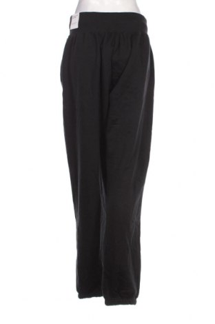 Pantaloni trening de femei Nike, Mărime M, Culoare Negru, Preț 305,92 Lei