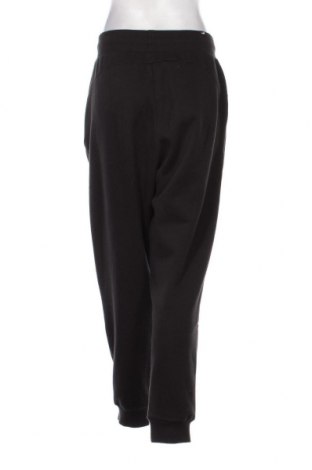 Γυναικείο αθλητικό παντελόνι PUMA, Μέγεθος M, Χρώμα Μαύρο, Τιμή 21,57 €