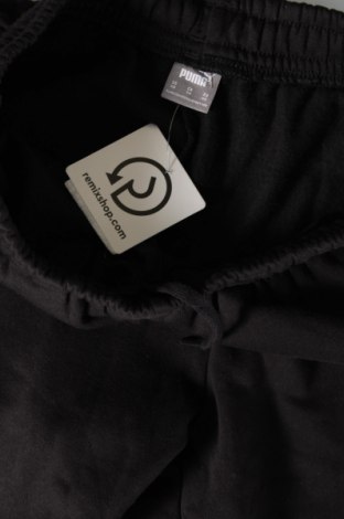 Γυναικείο αθλητικό παντελόνι PUMA, Μέγεθος XS, Χρώμα Μαύρο, Τιμή 21,57 €