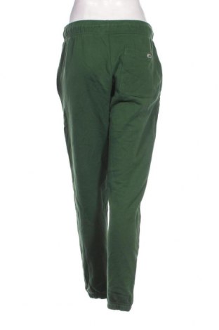 Дамско спортно долнище Tommy Jeans, Размер M, Цвят Зелен, Цена 156,00 лв.