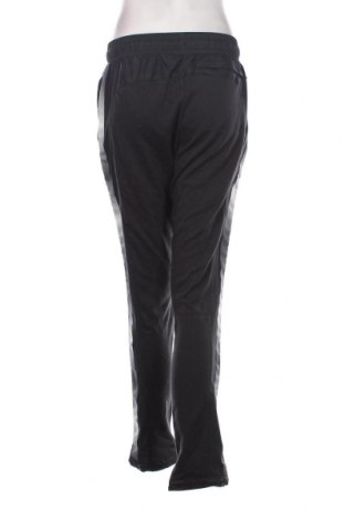 Pantaloni trening de femei Under Armour, Mărime M, Culoare Negru, Preț 121,38 Lei