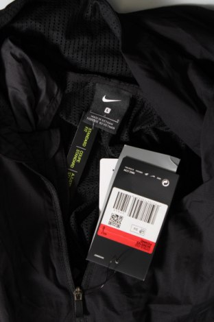 Γυναικείο μπουφάν Nike, Μέγεθος L, Χρώμα Μαύρο, Τιμή 66,56 €