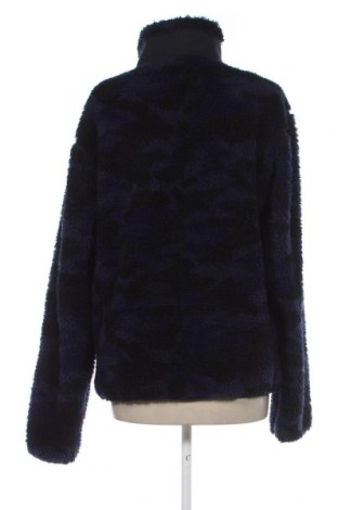 Γυναικείο μπουφάν Uniqlo, Μέγεθος L, Χρώμα Μπλέ, Τιμή 10,52 €