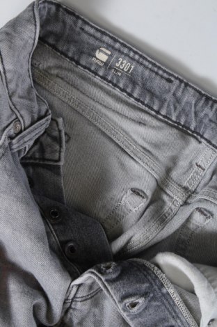 Męskie jeansy G-Star Raw, Rozmiar S, Kolor Niebieski, Cena 492,39 zł