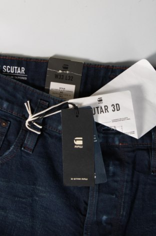 Męskie jeansy G-Star Raw, Rozmiar L, Kolor Niebieski, Cena 271,88 zł