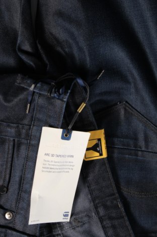 Męskie jeansy G-Star Raw, Rozmiar L, Kolor Niebieski, Cena 353,44 zł