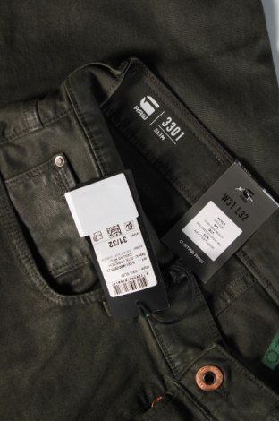 Męskie jeansy G-Star Raw, Rozmiar M, Kolor Zielony, Cena 299,06 zł