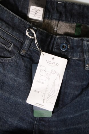 Męskie jeansy G-Star Raw, Rozmiar M, Kolor Niebieski, Cena 81,99 zł