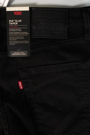 Męskie jeansy Levi's, Rozmiar M, Kolor Czarny, Cena 206,31 zł