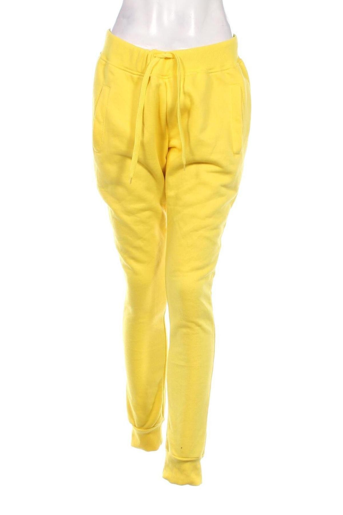 Γυναικείο αθλητικό παντελόνι, Μέγεθος XL, Χρώμα Κίτρινο, Τιμή 17,94 €