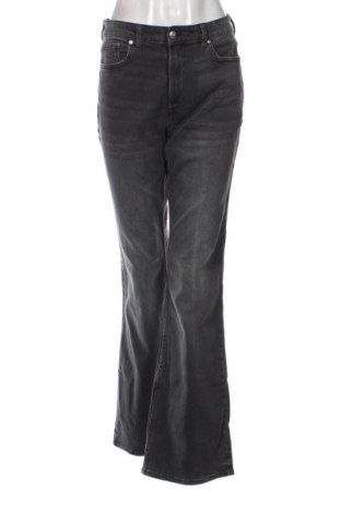 Damskie jeansy H&M, Rozmiar L, Kolor Szary, Cena 69,01 zł