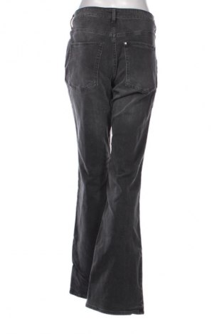 Damskie jeansy H&M, Rozmiar L, Kolor Szary, Cena 69,01 zł