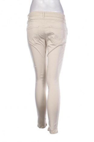 Damskie spodnie Calzedonia, Rozmiar M, Kolor Beżowy, Cena 94,25 zł