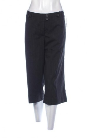 Damskie spodnie H&M, Rozmiar L, Kolor Kolorowy, Cena 109,08 zł