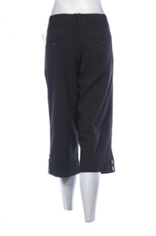 Damskie spodnie H&M, Rozmiar L, Kolor Kolorowy, Cena 109,08 zł