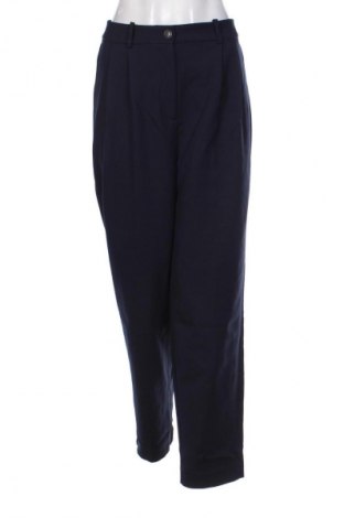Dámské kalhoty  Tommy Jeans, Velikost L, Barva Modrá, Cena  891,00 Kč
