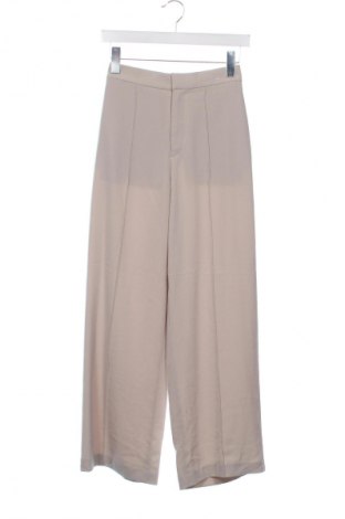 Damskie spodnie Uniqlo, Rozmiar XXS, Kolor Beżowy, Cena 134,99 zł