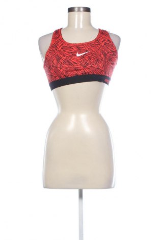 Damski sportowy top Nike, Rozmiar L, Kolor Kolorowy, Cena 78,16 zł