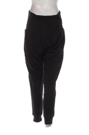 Damskie spodnie sportowe LC Waikiki, Rozmiar XL, Kolor Czarny, Cena 110,34 zł
