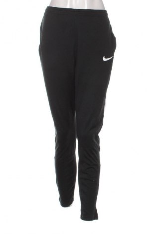 Pantaloni trening de femei Nike, Mărime L, Culoare Negru, Preț 139,99 Lei
