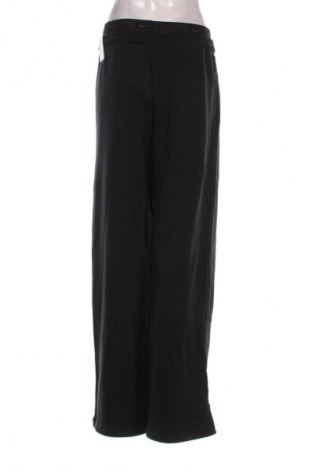 Pantaloni trening de femei Nike, Mărime M, Culoare Negru, Preț 316,99 Lei