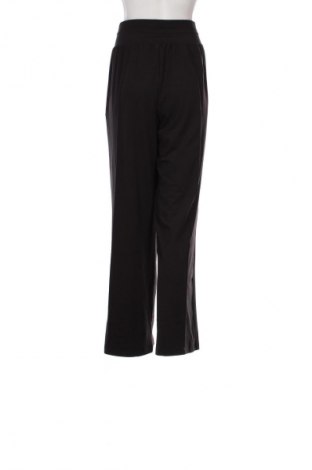 Dámske tepláky PUMA, Veľkosť L, Farba Čierna, Cena  54,95 €