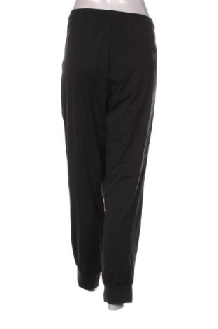 Γυναικείο αθλητικό παντελόνι Uniqlo, Μέγεθος 3XL, Χρώμα Μαύρο, Τιμή 49,99 €