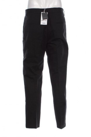 Herrenhose Dan Fox X About You, Größe M, Farbe Schwarz, Preis € 75,99