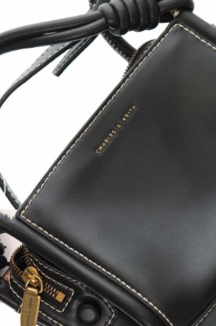 Дамска чанта Charles & Keith, Цвят Черен, Цена 30,75 лв.
