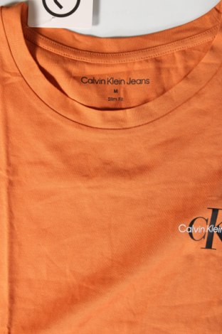 Damen T-Shirt Calvin Klein Jeans, Größe M, Farbe Orange, Preis 35,72 €